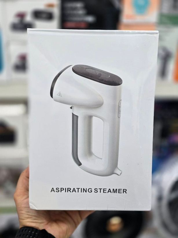 دستگاه اتو بخار مکشی (Aspirating Steamer / Suction-Type Ironing Machine